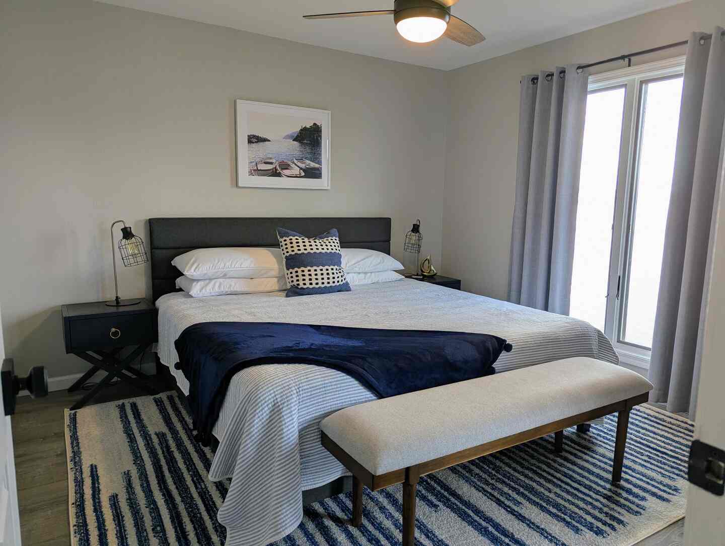 Queen bed detail in the second bedroom at Kimberling City Getaway