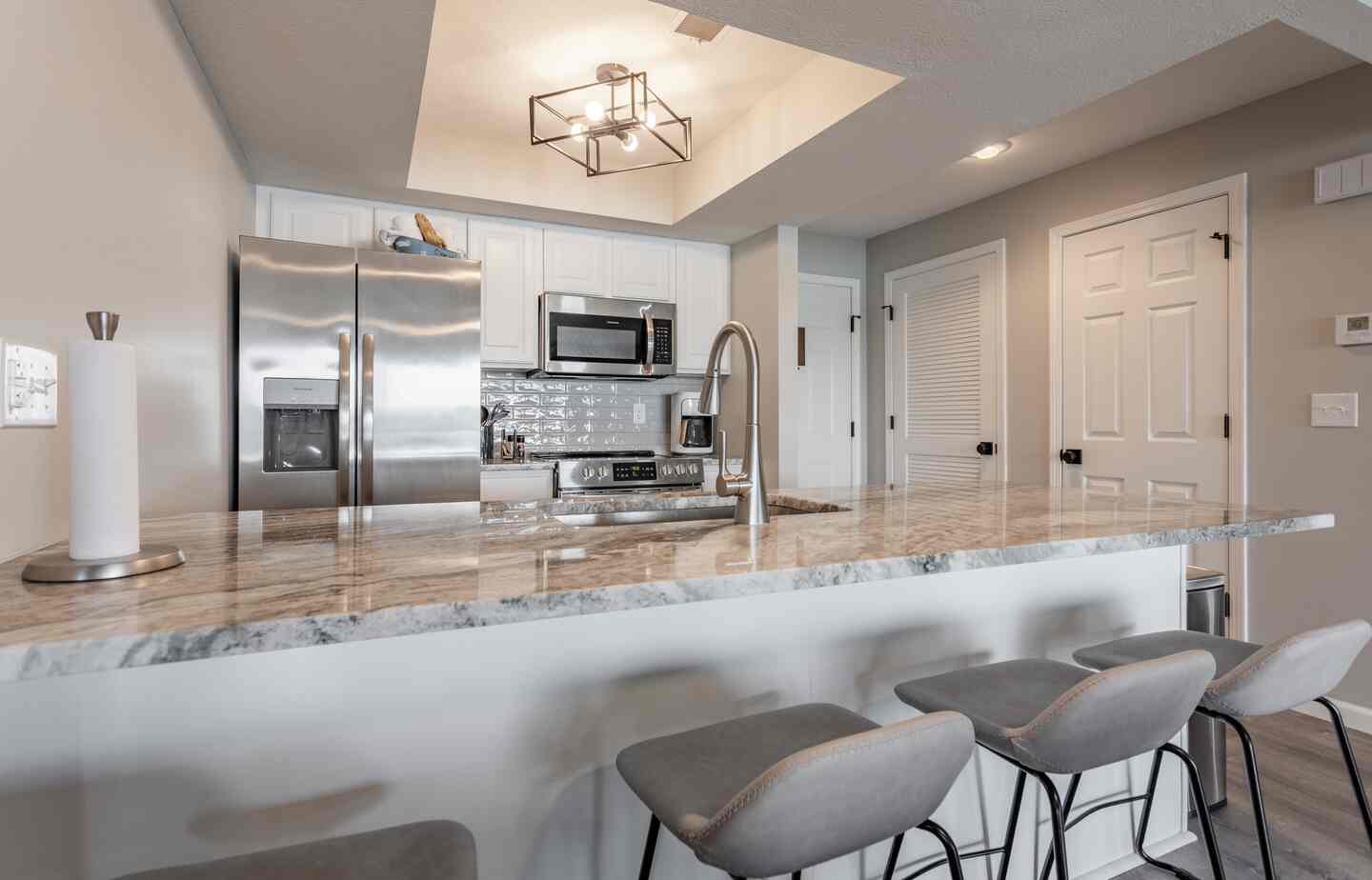 Full kitchen with stainless steel appliances at Kimberling City Getaway
