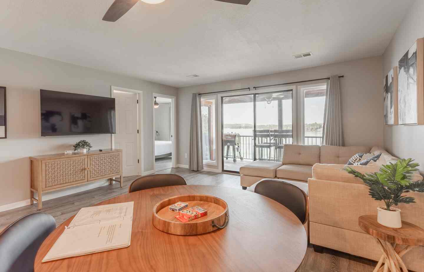 Dining table with games and guest info at Kimberling City Getaway condo