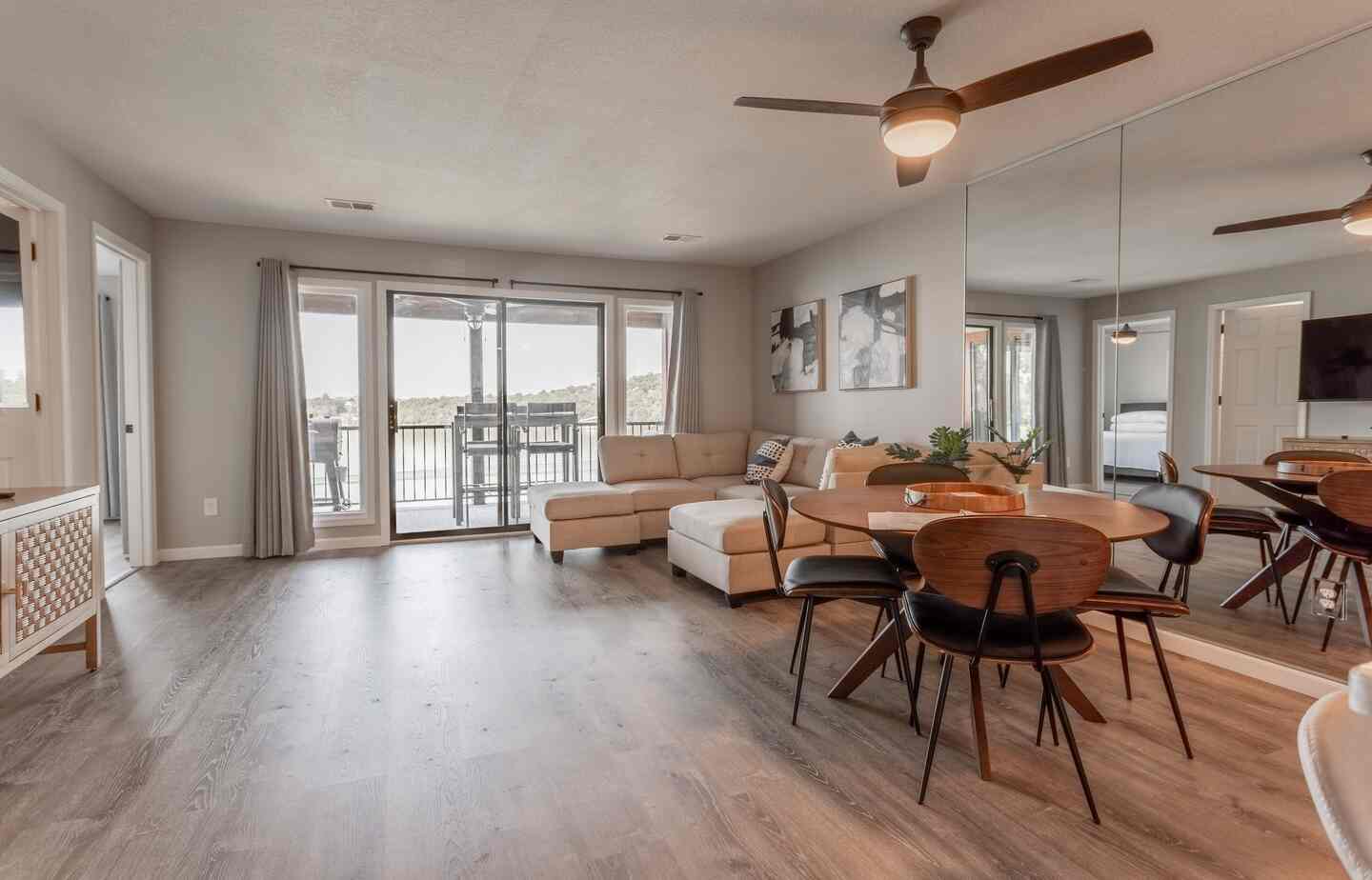 Sectional sofa and dining table in the open living area at Kimberling City Getaway